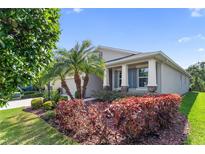 Charming single Gathering home with well manicured landscape and stone accents on the columns at 6124 35Th E Ct, Bradenton, FL 34203