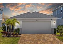 Attractive single-Gathering home with a spacious garage and lush landscaping at 11571 Little River Way, Parrish, FL 34219