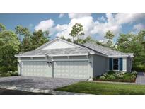 Charming single-Gathering home featuring an attached three-car garage and well-maintained landscaping at 16210 Isola Pl, Bradenton, FL 34211