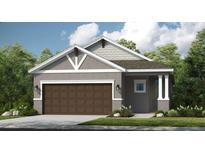 Charming single-story home with a two-car garage, neutral paint scheme, and well-maintained landscaping at 8561 Snowfall St, Sarasota, FL 34241