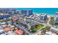 Stunning aerial view of condo complex near beach and commercial district at 845 Benjamin Franklin Dr # 106, Sarasota, FL 34236