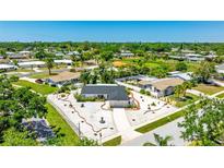 Charming home boasts a well-maintained yard with beautiful landscaping, enhancing its curb appeal at 6628 Keystone Dr, Sarasota, FL 34231