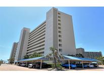 Beautiful multi-story condo with ample parking and lush landscaping at 5920 Midnight Pass Rd # 406, Sarasota, FL 34242