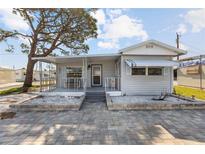 Charming single-story home with well-maintained landscaping and a welcoming front porch area at 10315 Cortez W Rd # 24-5, Bradenton, FL 34210