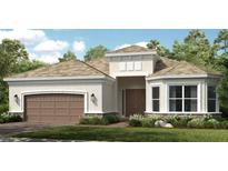 Charming single-story home boasting a two-car garage, neutral stucco exterior, and well-manicured front yard at 15408 San Lazzaro Ave, Bradenton, FL 34211
