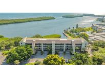 Waterfront condo with lush landscaping and stunning views of the bay and mature trees at 4500 Gulf Of Mexico Dr # Ph4, Longboat Key, FL 34228