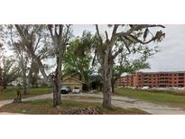 Charming single-Gathering home with mature landscaping and two-car garage at 6906 Simmons Loop, Riverview, FL 33578