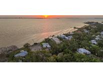Waterfront homes along the coast offer stunning views and a peaceful community at 3931 Bay Shore Rd, Sarasota, FL 34234