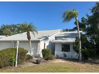 A beautiful single Gathering home with an attached garage and manicured landscaping at 3602 Bonaventure Ct, Sarasota, FL 34243