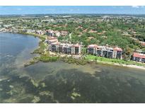 Waterfront condos feature breathtaking views, lush landscaping, and access to the bay at 6460 Mourning Dove Dr # 102, Bradenton, FL 34210