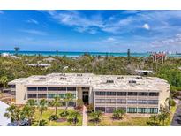 A beautiful, multi-story condo with views of the ocean at 225 Hourglass Way # 101, Sarasota, FL 34242