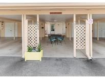 Outdoor patio features covered dining area perfect for enjoying meals and entertaining guests at 5057 Live Oak Cir # 86, Bradenton, FL 34207
