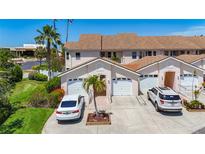 Charming townhomes with well-manicured lawns, driveways and attached garages, perfect for Florida living at 2609 Waterford Way # B, Palmetto, FL 34221