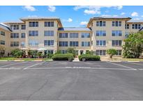 Well-maintained condo building with lush landscaping and ample parking in a desirable community at 3806 Gulf Of Mexico Dr # C311, Longboat Key, FL 34228