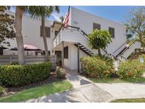Inviting two-story condo with lush landscaping and a charming entrance at 536 Lakeside Dr # 0, Bradenton, FL 34210
