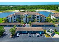 Luxury condo community offering covered parking, a golf course, lake, and scenic views at 16804 Vardon Ter # 205, Bradenton, FL 34211