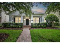 Charming one story home with a well-manicured lawn and inviting brick pathway at 11504 Splendid Ln, Tampa, FL 33626