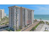 High-rise beachfront condo with balconies, offering stunning ocean views and convenient beach access at 1212 Benjamin Franklin Dr # 306, Sarasota, FL 34236
