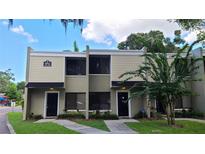 Inviting townhouse exterior featuring well-manicured landscaping and a serene, neighborhood feel at 4941 25Th W St # 101, Bradenton, FL 34207