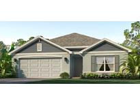 Charming single-story home with a well-manicured lawn and a two-car garage, providing both comfort and convenience at 4304 112Th E St, Palmetto, FL 34221