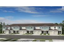 New townhomes with attached garages and manicured landscaping offer modern living at 15048 Cuzcorro Ct, Nokomis, FL 34275