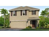 Charming two-story home with a two car garage, neutral color palette and simple, tropical landscaping at 17255 Whiskey Creek Trl, Parrish, FL 34219