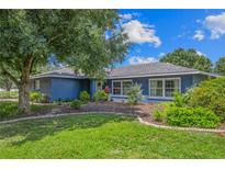 Charming single-story home featuring a beautifully landscaped yard and a freshly painted exterior at 6605 253Rd St E, Myakka City, FL 34251
