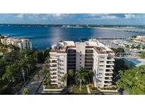 Multi-story condominium with balconies, offering waterfront views and convenient marina access at 1400 1St W Ave # 506, Bradenton, FL 34205