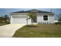 Charming single-Gathering home features a two-car garage, well-maintained lawn, and fresh landscaping at 12127 Storke Ave, Port Charlotte, FL 33981