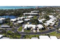 Desirable community offering villas, condos, pool and water views in a lush landscape near beaches and downtown at 111 Whispering Sands Cir # V38, Sarasota, FL 34242