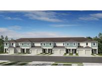 New townhome construction featuring a row of homes with attached garages and modern facades at 15144 Cuzcorro Ct, Nokomis, FL 34275