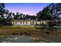 Charming single-story home featuring a neatly maintained front yard and classic architectural details at 3619 Elm St, Ellenton, FL 34222