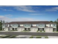 Beautiful townhome exterior with modern design and well-manicured lawns at 15160 Cuzcorro Ct, Nokomis, FL 34275