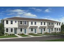 Charming townhome exterior with neutral siding, well-maintained landscaping, and a welcoming entrance at 16554 San Nicola Pl, Lakewood Ranch, FL 34211