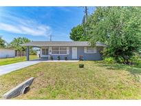Charming single story home with a well-maintained lawn, covered entry and freshly painted exterior at 5710 16Th W St, Bradenton, FL 34207