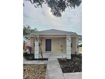 Charming single-story home featuring a minimalist front yard and a classic, inviting entrance at 2411 5Th Avenue E Dr, Palmetto, FL 34221