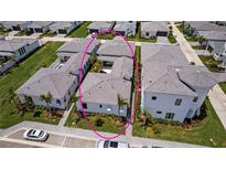 Stunning aerial view of pristine, modern single Gathering home with perfectly manicured landscaping at 5910 Red Mangrove Ln, Bradenton, FL 34210