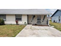 Charming single story home with covered front porch and a well-maintained yard at 4304 78Th W St # 4304, Bradenton, FL 34209