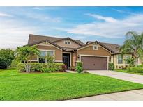 Inviting single-Gathering home with manicured lawn and mature landscaping at 10708 52Nd E Ct, Parrish, FL 34219