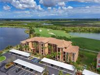 Stunning condo overlooking a meticulously maintained golf course and tranquil lake views at 8105 Grand Estuary Trl # 105, Bradenton, FL 34212