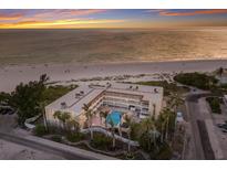 Beautiful beachside condos featuring a community pool and easy access to the pristine sandy beach and ocean at 4200 Gulf Dr # 104, Holmes Beach, FL 34217