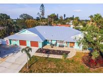 Inviting single-Gathering home with a well-manicured lawn and a two-car garage at 1021 Estremadura Dr, Bradenton, FL 34209