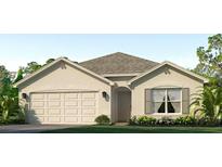 Charming single-story home with neutral stucco, attached two-car garage, and decorative window details at 10836 Gentle Current Way, Parrish, FL 34219