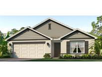 Inviting single-story home with a two-car garage, shuttered window, and charming landscaping at 10837 Gentle Current Way, Parrish, FL 34219