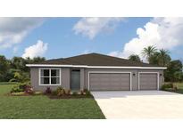 Charming single-story home showcasing a well-manicured lawn, neutral gray paint, and a convenient three-car garage at 17467 Whiskey Creek Trl, Parrish, FL 34219