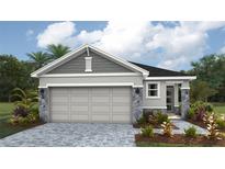 Charming single-Gathering home with a two-car garage and stone detailing at 1856 Cobb Trl, Parrish, FL 34219