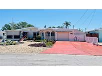 Charming single-story home with a well-maintained lawn and inviting curb appeal at 409 Bryn Mawr Is, Bradenton, FL 34207