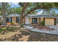 Charming single-story home with well-kept lawn and decorative landscaping at 4468 Maraldo Ave, North Port, FL 34287
