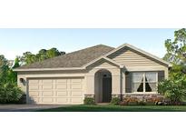 Charming single-story home featuring a two-car garage, stone accents, manicured lawn, and inviting covered entry at 18309 Canopy Pl, Lakewood Ranch, FL 34211