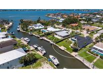 Beautiful waterfront property with canal access and private boat dock at 7779 Holiday N Dr, Sarasota, FL 34231